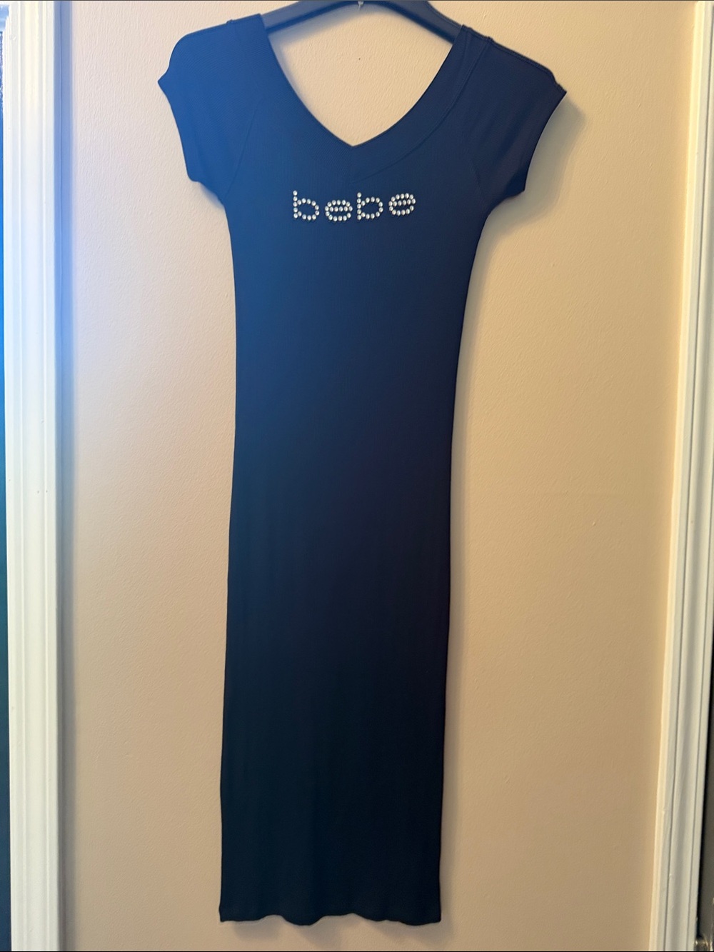 Black Bebe midi dress, figure fitting, sexy fit.